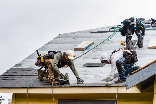 Professional Gutter Installation technician working in Bristow, OK